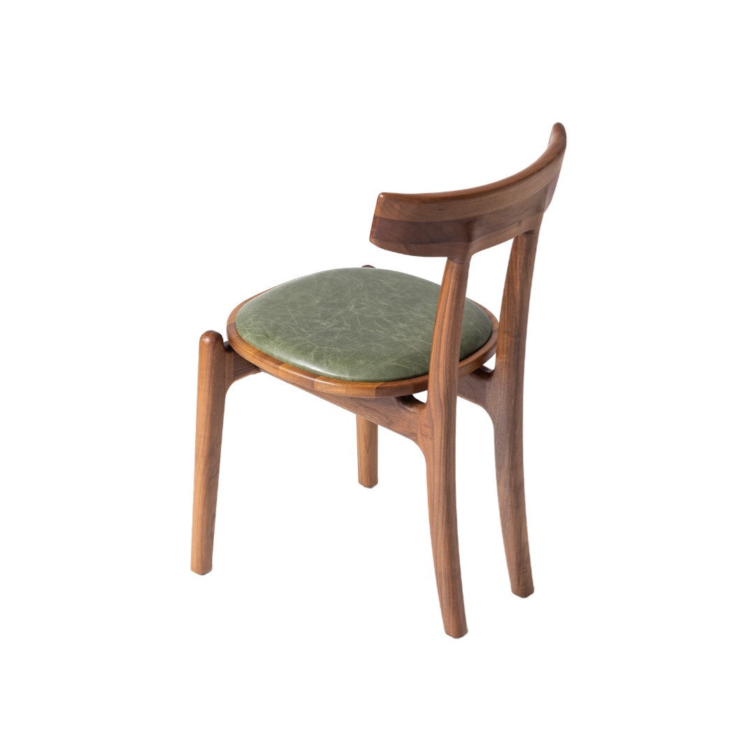 STIA-Designerstuhl aus Massivholz und Lederpolsterung-seitlich von hinten-nussbaum